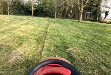 Gras maaien en wegbrengen