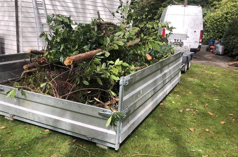 Opkuisen tuin en afvoeren groenafval 1